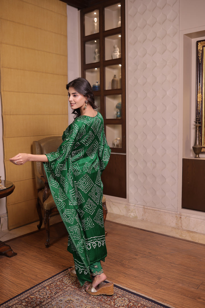 Dark Green Gajji silk Kaftan with Dori, Pearl and Zardozi work.