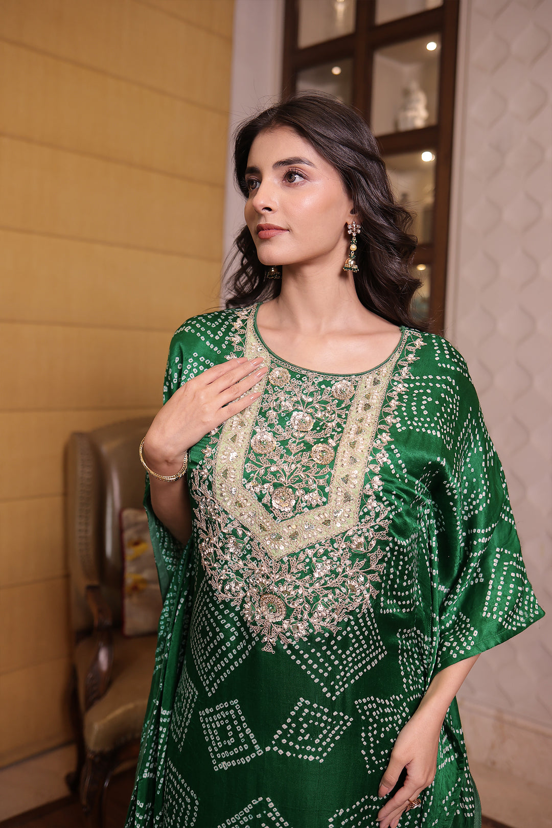 Dark Green Gajji silk Kaftan with Dori, Pearl and Zardozi work.