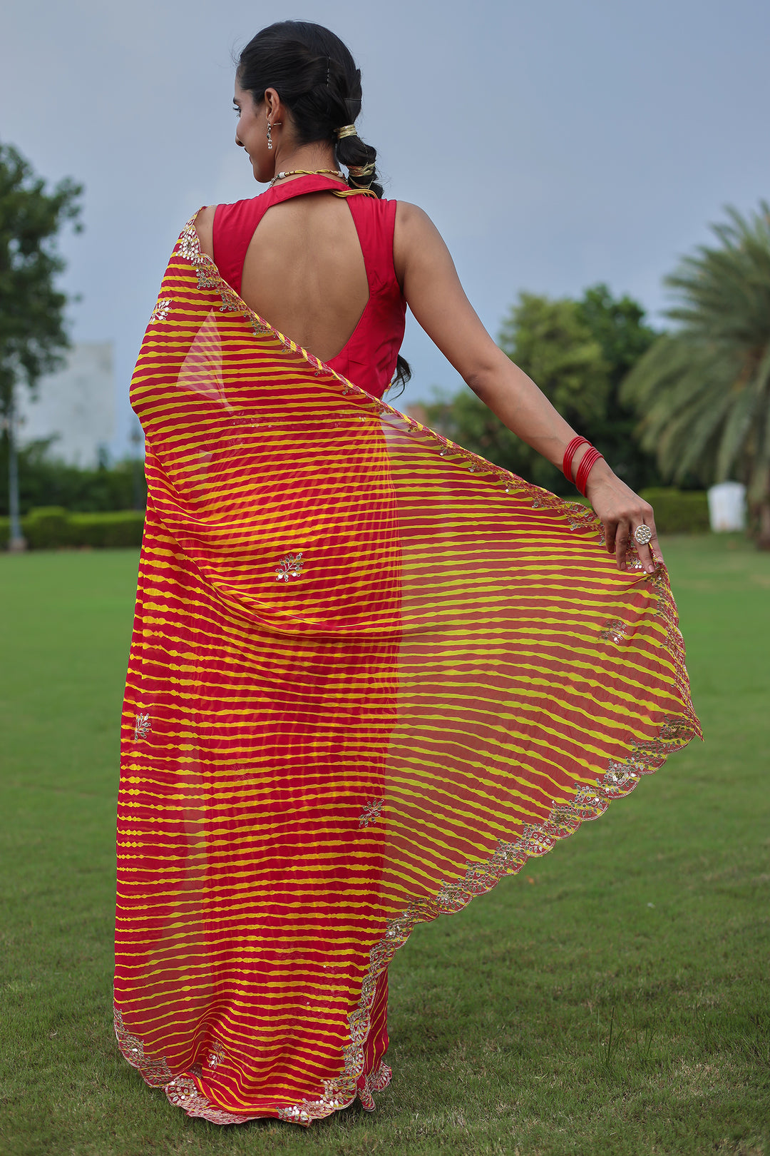 Leheriya Georgette Saree with Aari and Gota Patti work