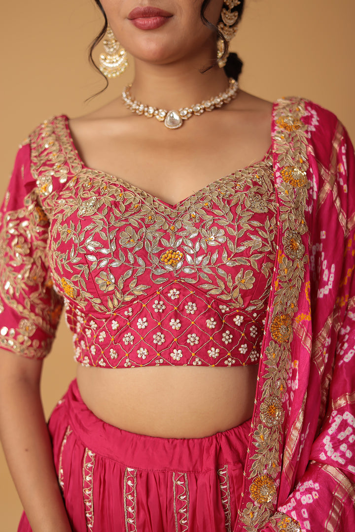 Bandhej Silk Lehenga Embellished with Gota Patti, Thread and Zardozi work.