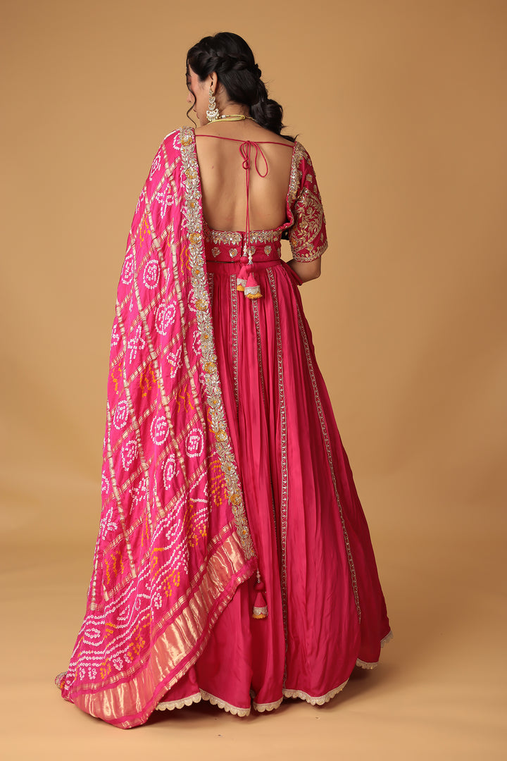 Bandhej Silk Lehenga Embellished with Gota Patti, Thread and Zardozi work.