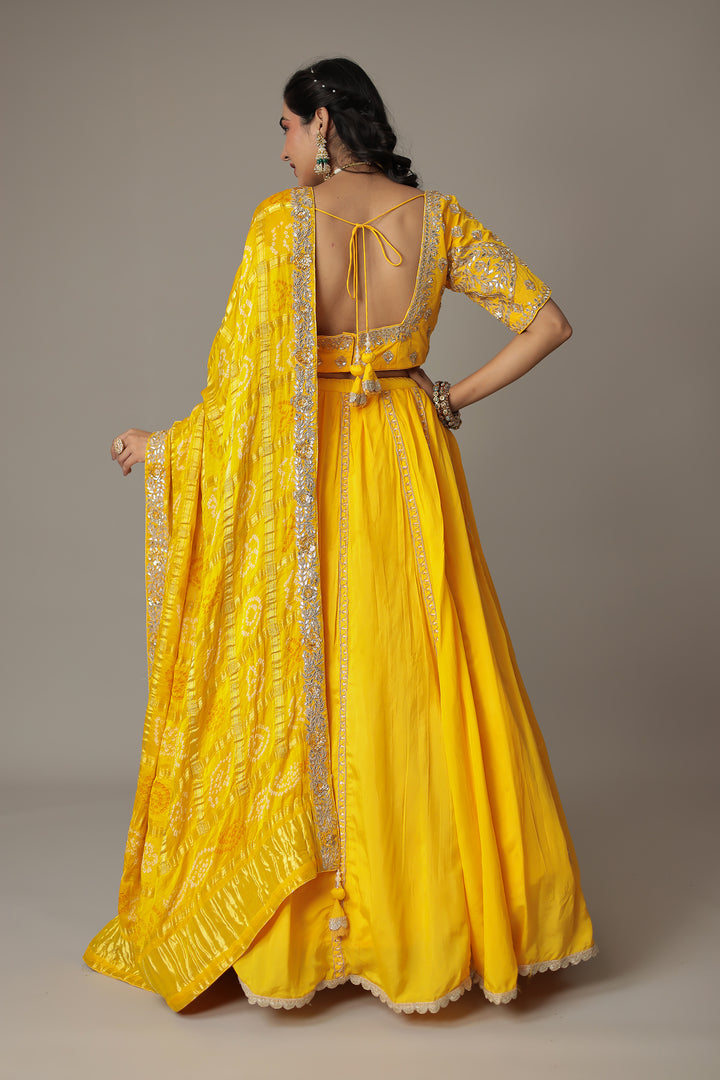 Bandhej Silk Lehenga Embellished with Gota Patti, Thread and Zardozi work.
