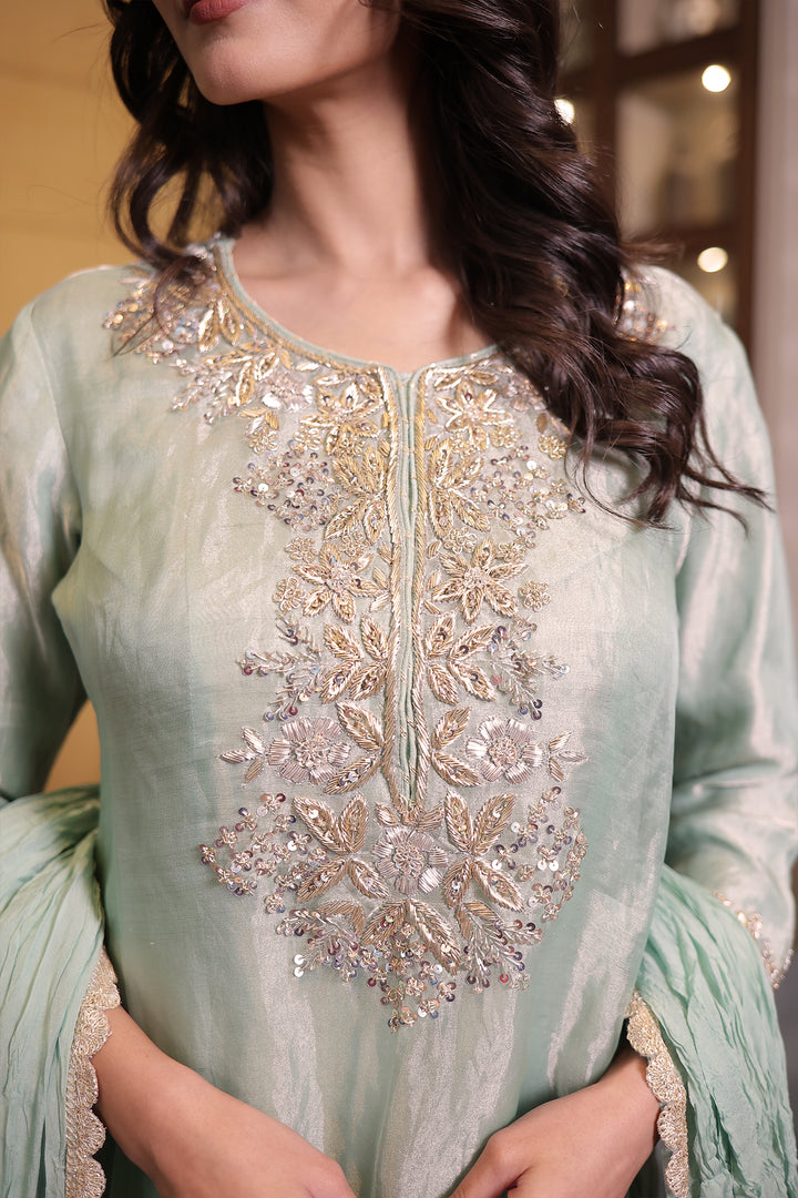 Elegant Tissue Suit set with Sequins and Zardozi work.