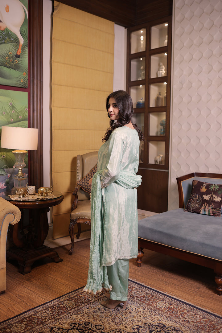 Elegant Tissue Suit set with Sequins and Zardozi work.