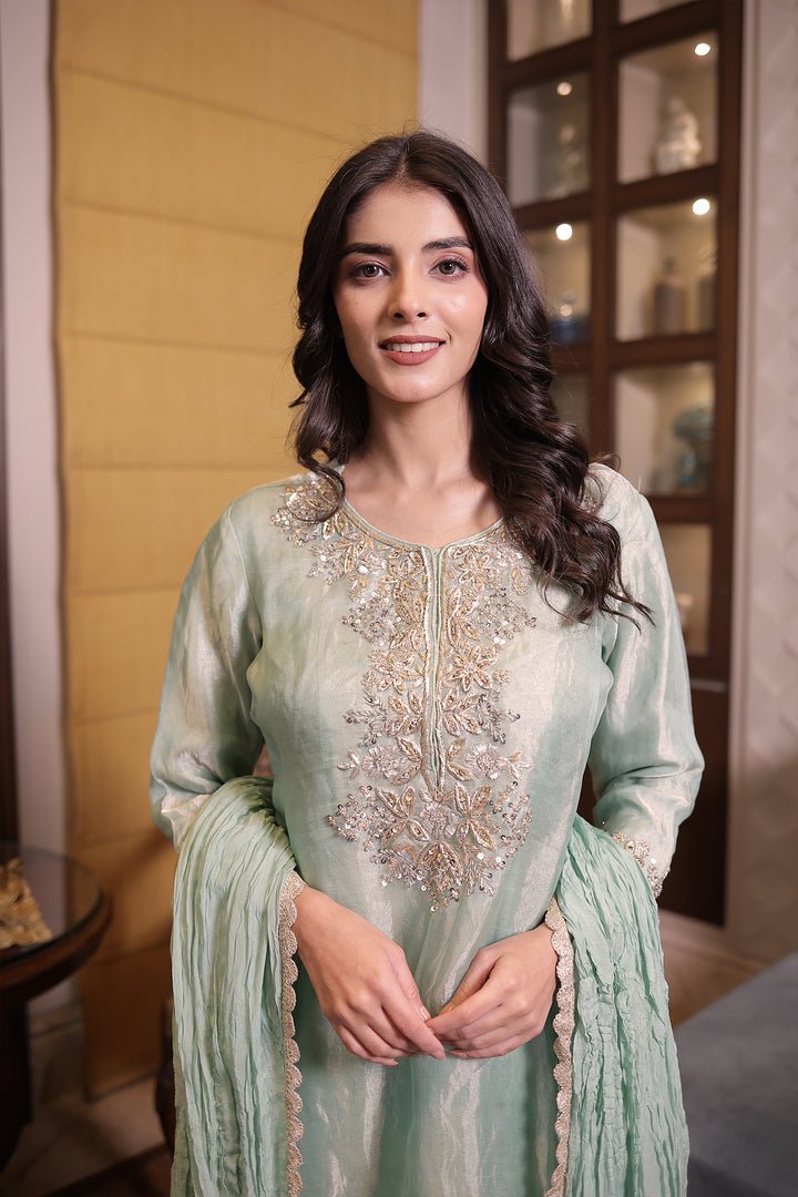 Elegant Tissue Suit set with Sequins and Zardozi work.