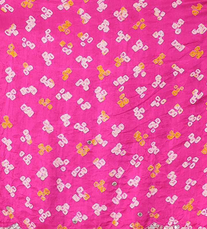 Timeless Bandhej Gajji Silk Saree with Aari and Mirror work.