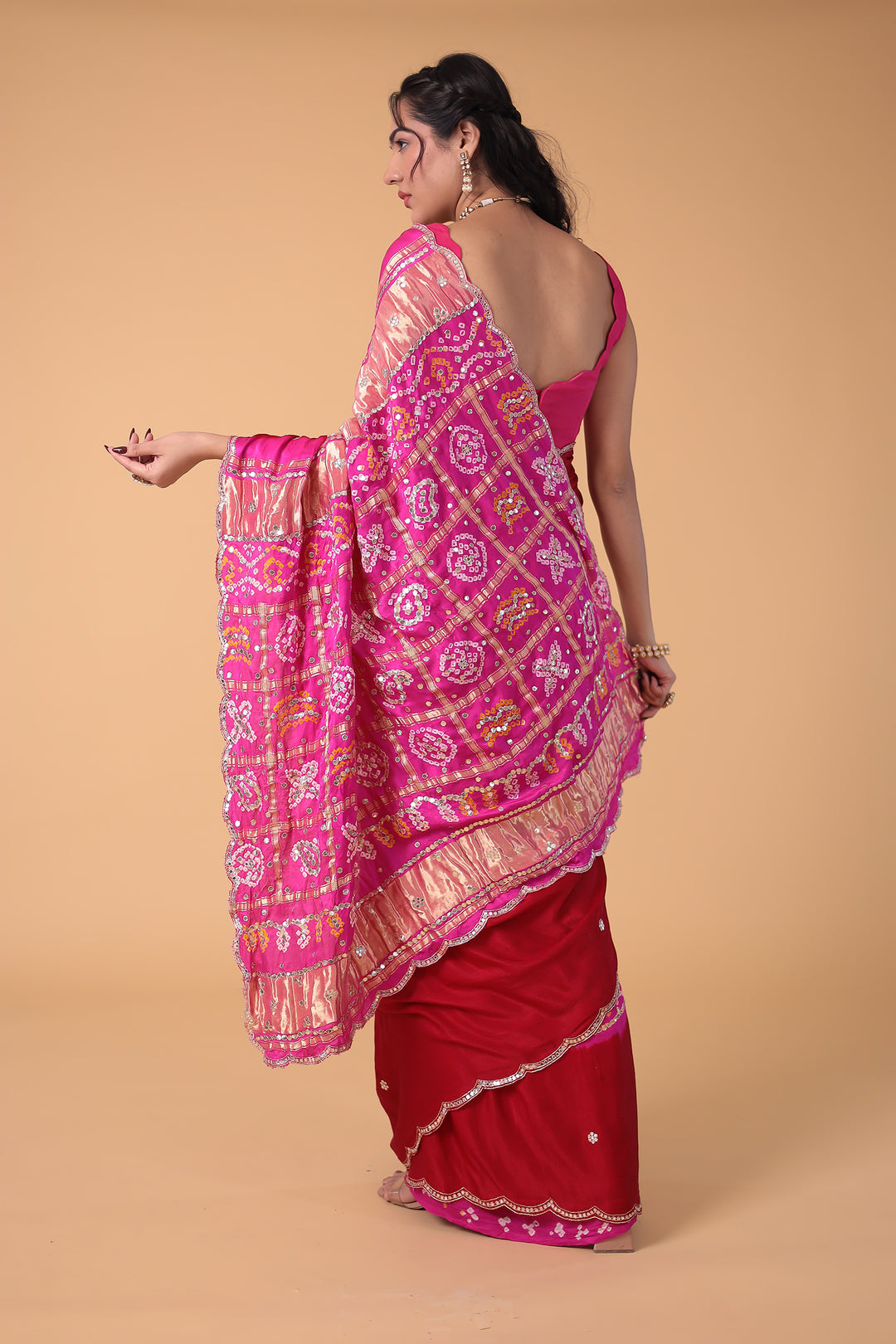 Timeless Bandhej Gajji Silk Saree with Aari and Mirror work.