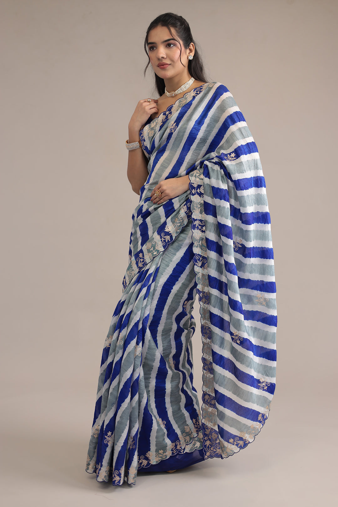 Light Blue Leheriya Tussar Silk  Saree  with Aari work