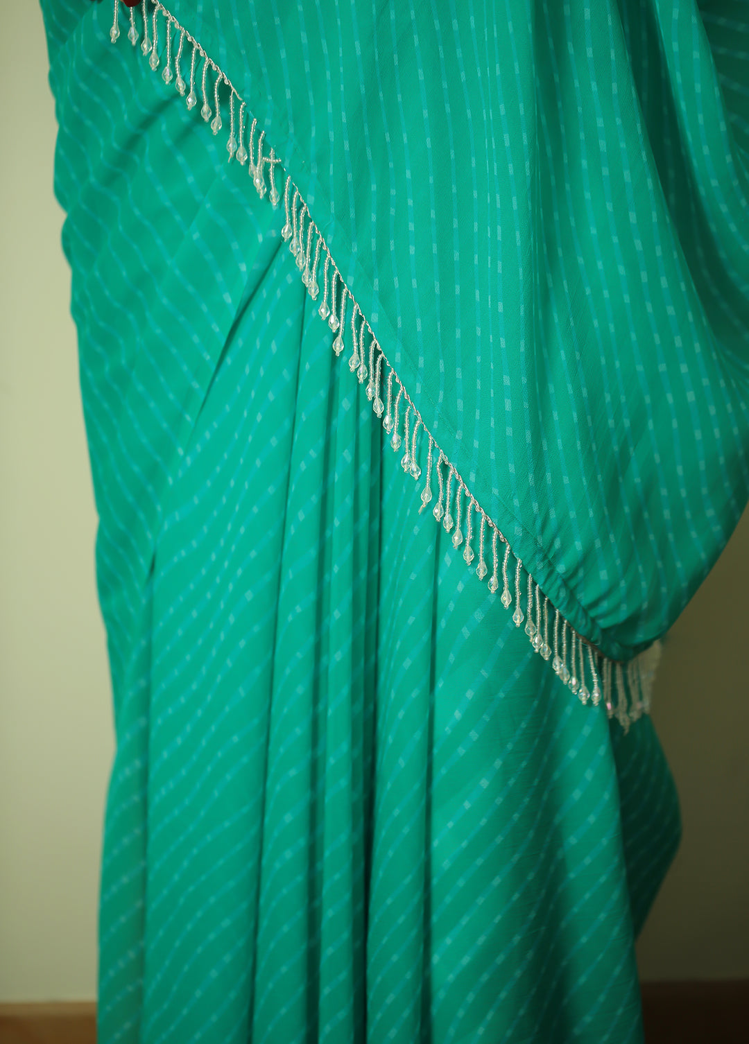 Leheriya chiffon Saree with tessels work.