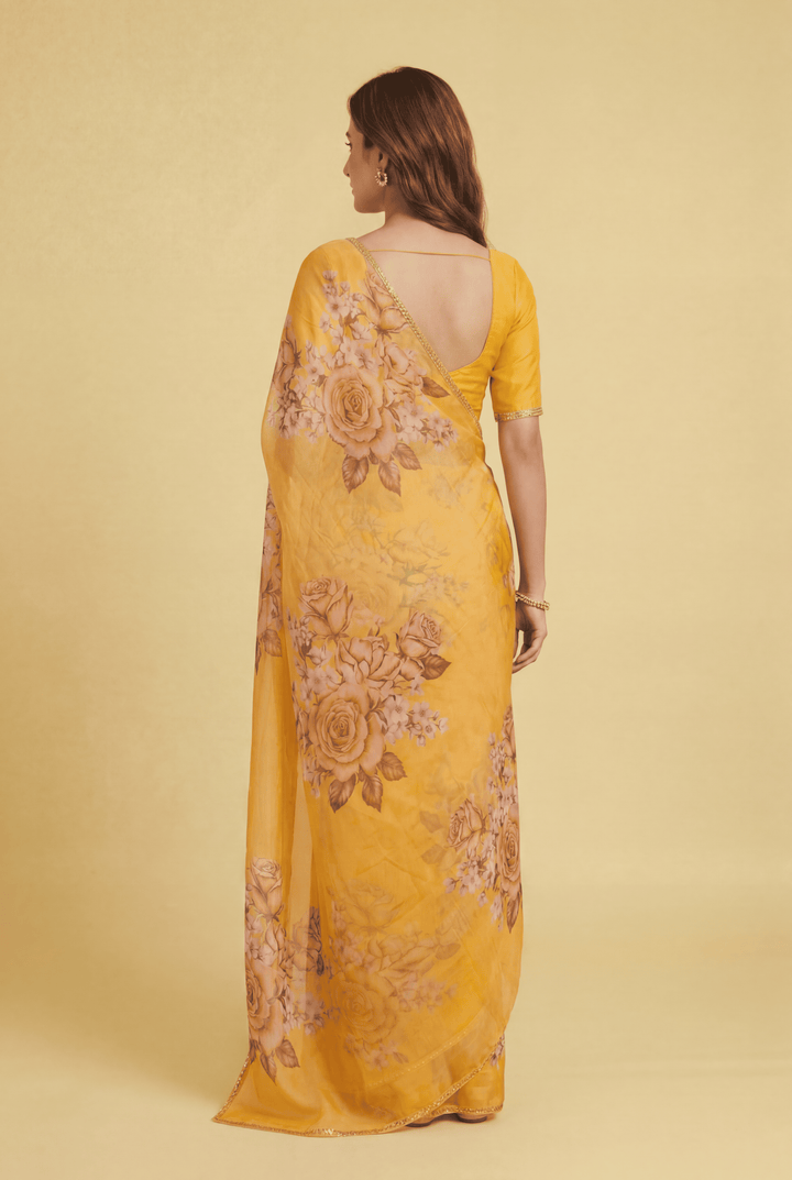 Printed Chiffon Saree with Zari work.