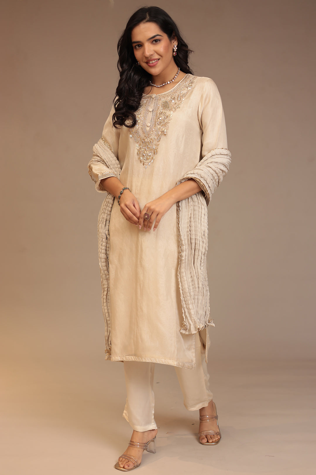 Tissue Suit with Aari, Sequins, Zardozi work.