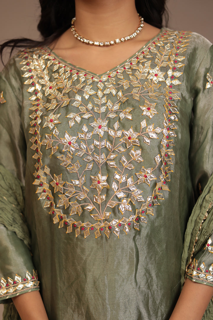 Tissue shimmer silk Suit with Gota, Gota Patti, Thread work.