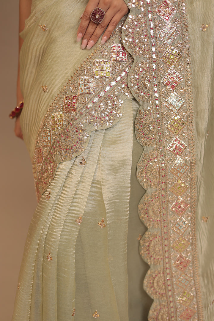 Tissue Saree with Dori, Gota Patti, Mirror, Pearl, Sequins, Zardozi work.