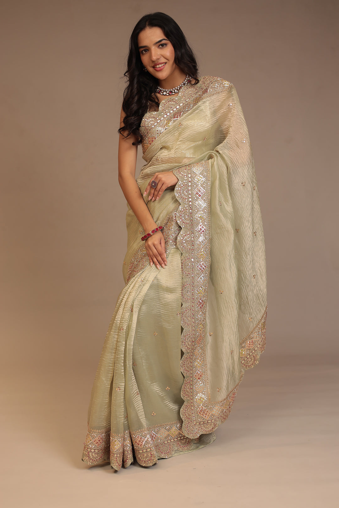 Tissue Saree with Dori, Gota Patti, Mirror, Pearl, Sequins, Zardozi work.