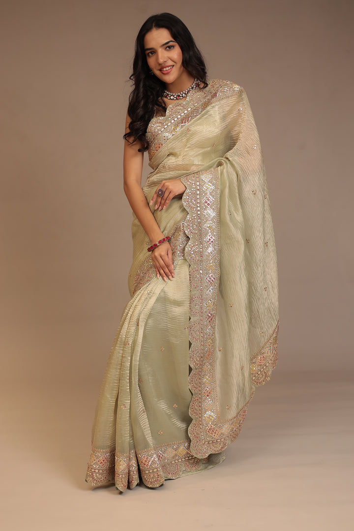 Tissue Saree with Dori, Gota Patti, Mirror, Pearl, Sequins, Zardozi work.