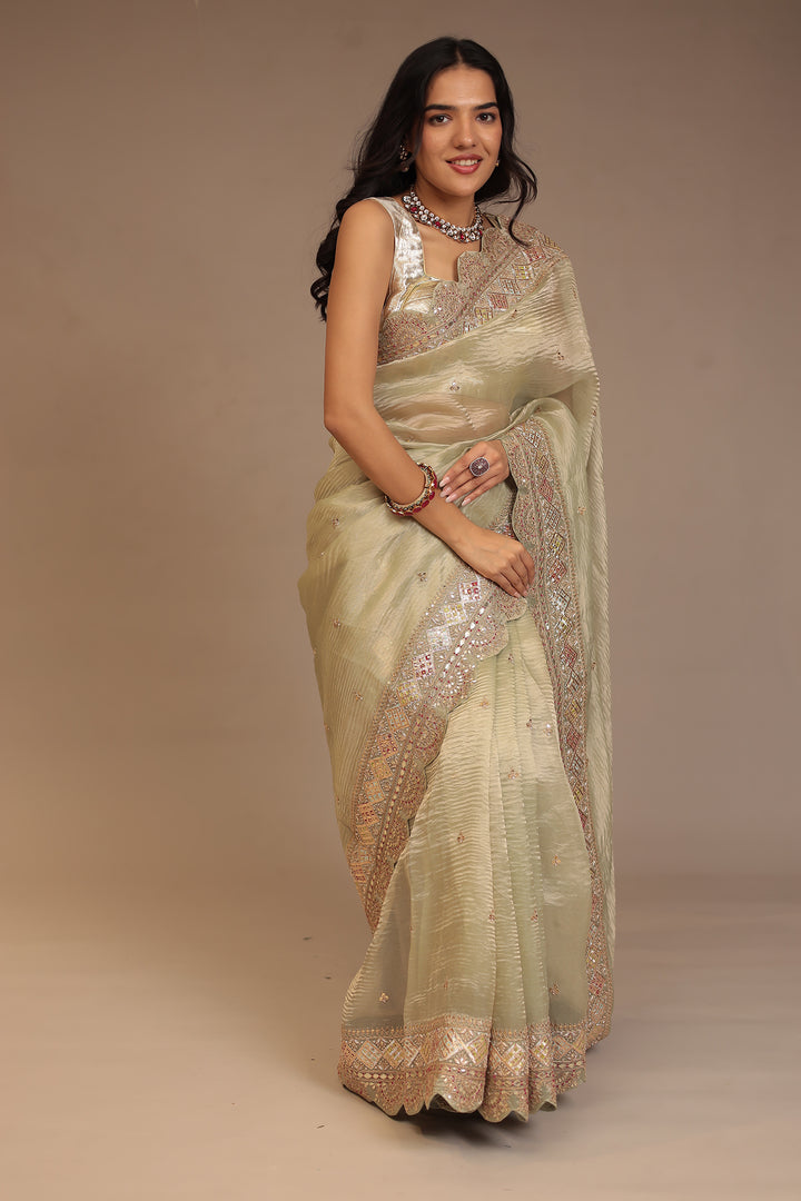 Tissue Saree with Dori, Gota Patti, Mirror, Pearl, Sequins, Zardozi work.