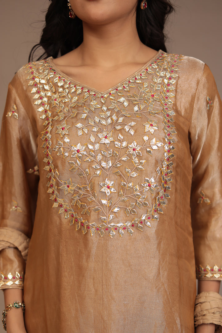 Tissue shimmer silk Suit with Gota Patti, Thread work.