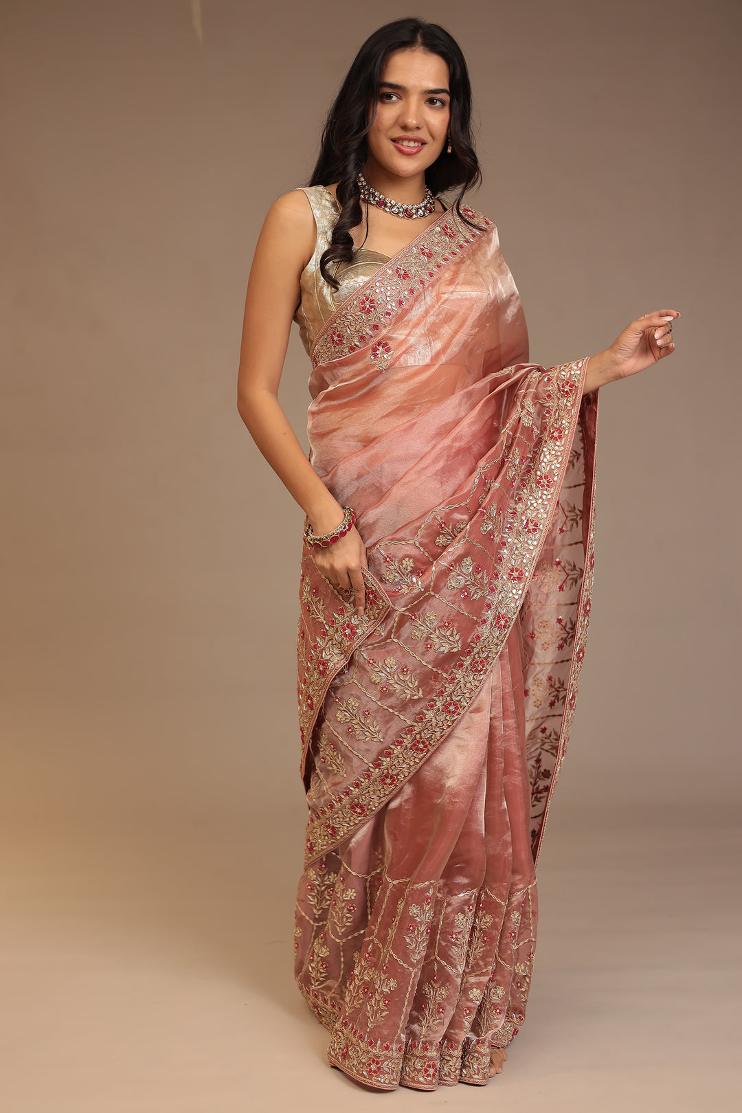 Tissue Saree with Aari, Gota Patti, Sequins, Thread, Zardozi work.