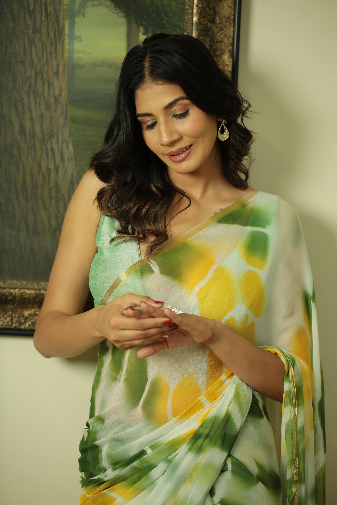 Tie & Dye Chiffon Saree with Zari work.
