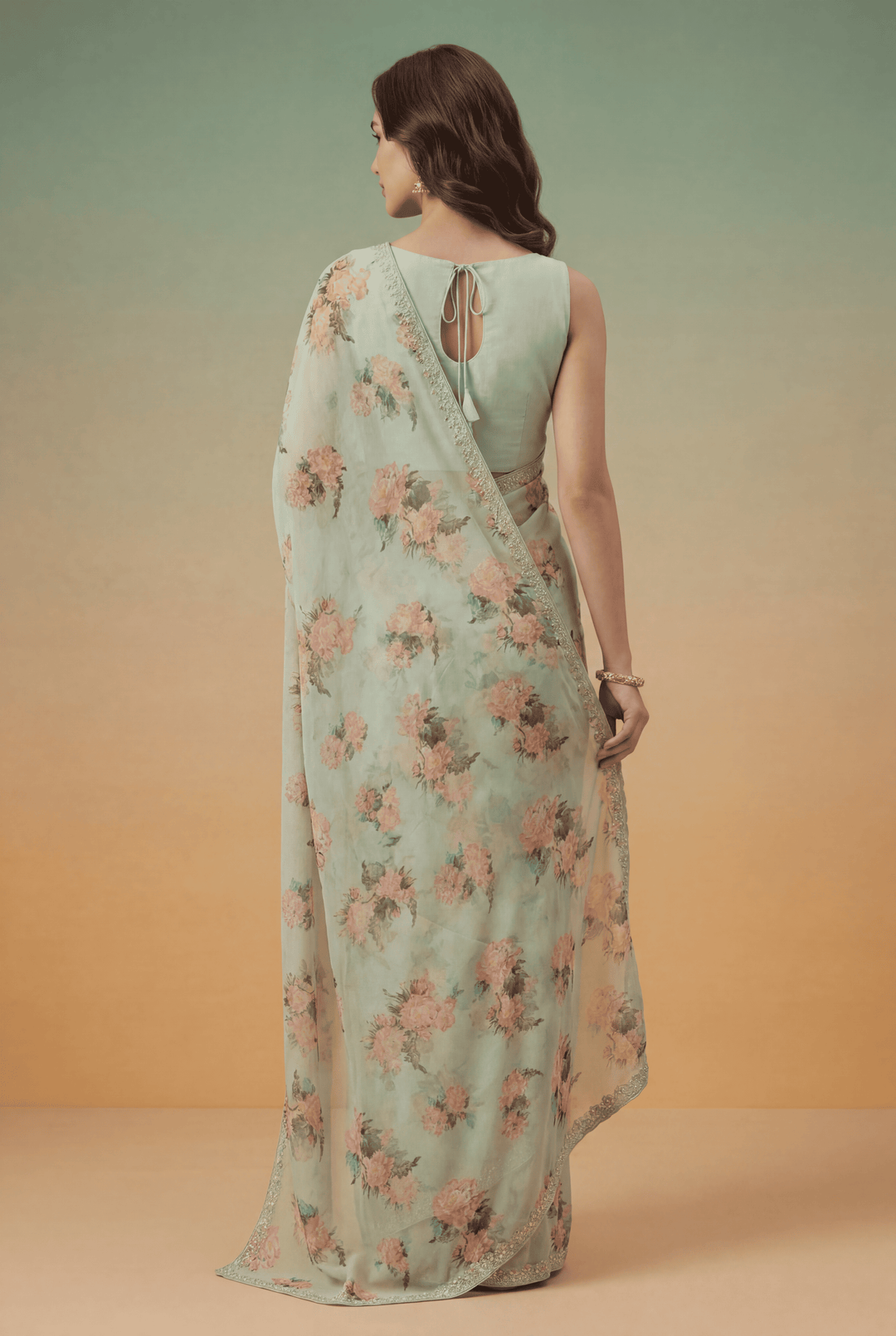 Printed Georgette Saree with Zari work.