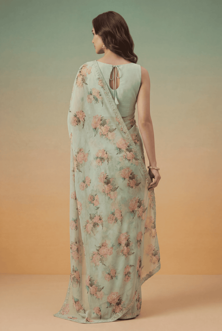 Printed Georgette Saree with Zari work.