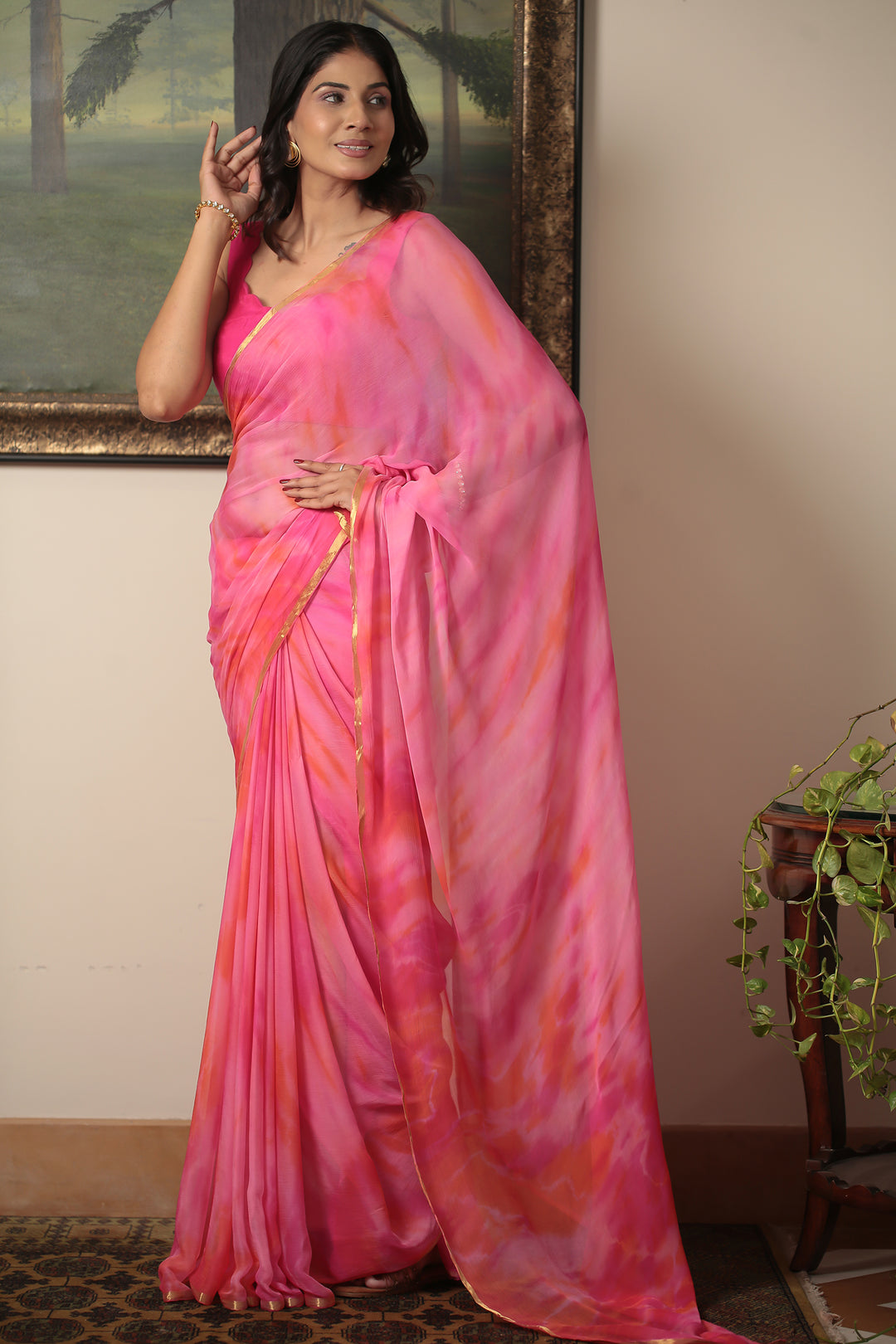 Tie & Dye chiffon Saree with Zari work.