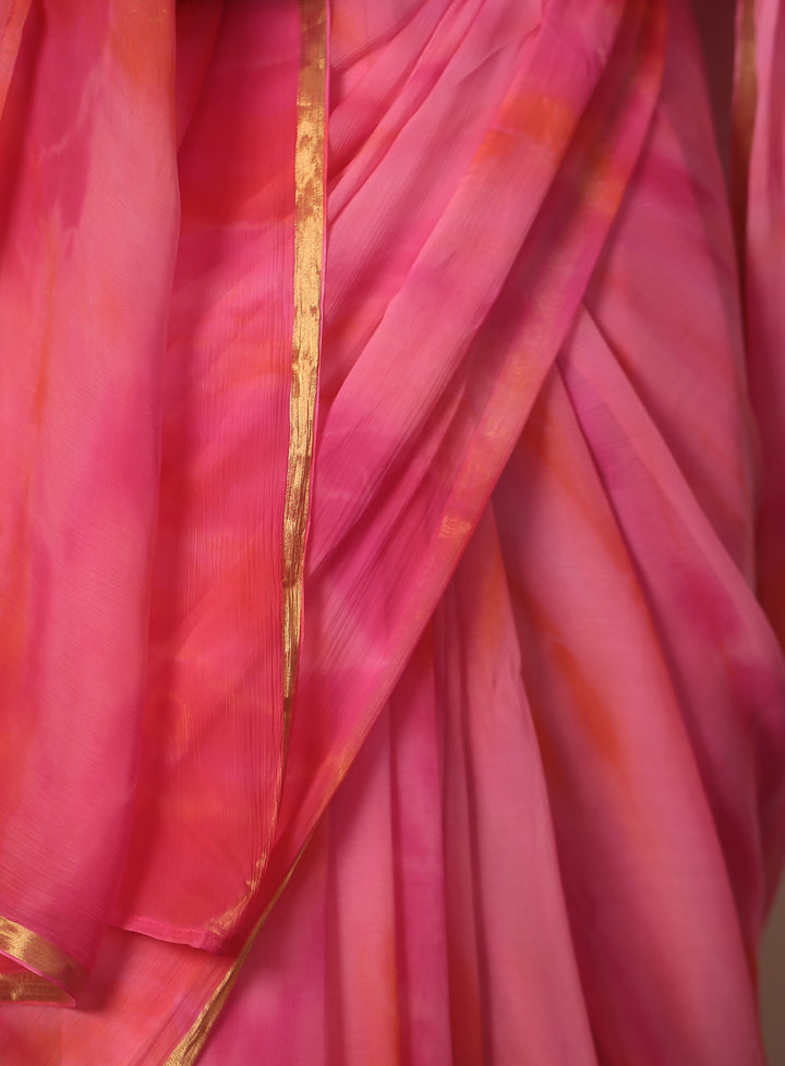 Tie & Dye chiffon Saree with Zari work.
