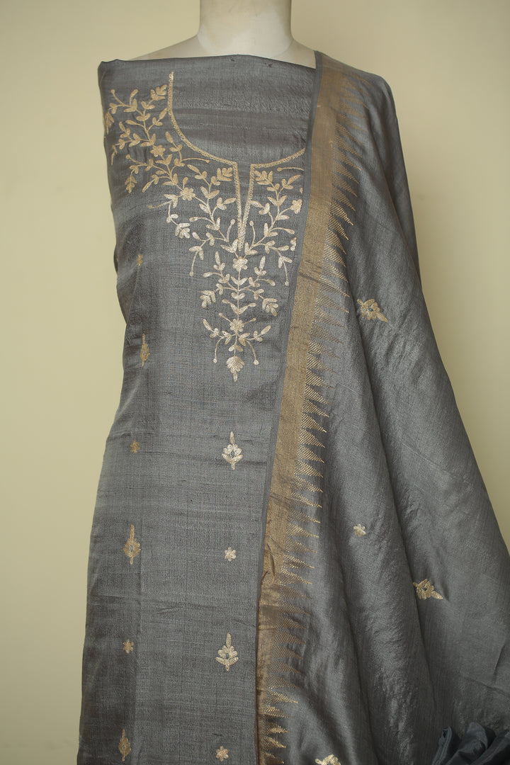 Tussar silk Unstitched Suit with Pittan work.