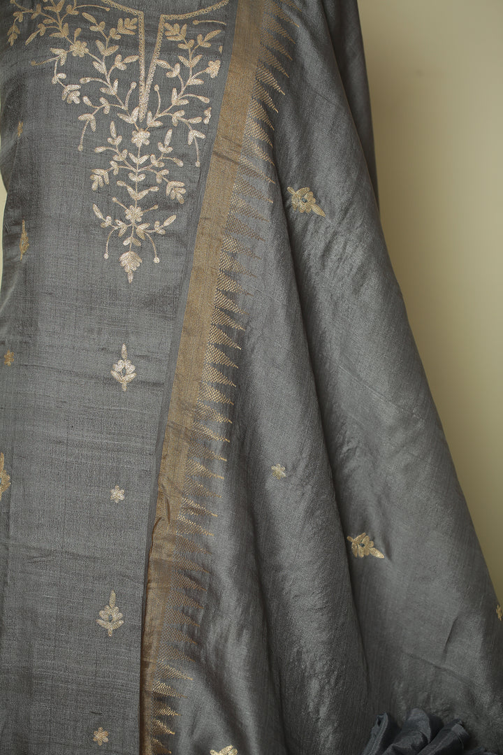 Tussar silk Unstitched Suit with Pittan work.