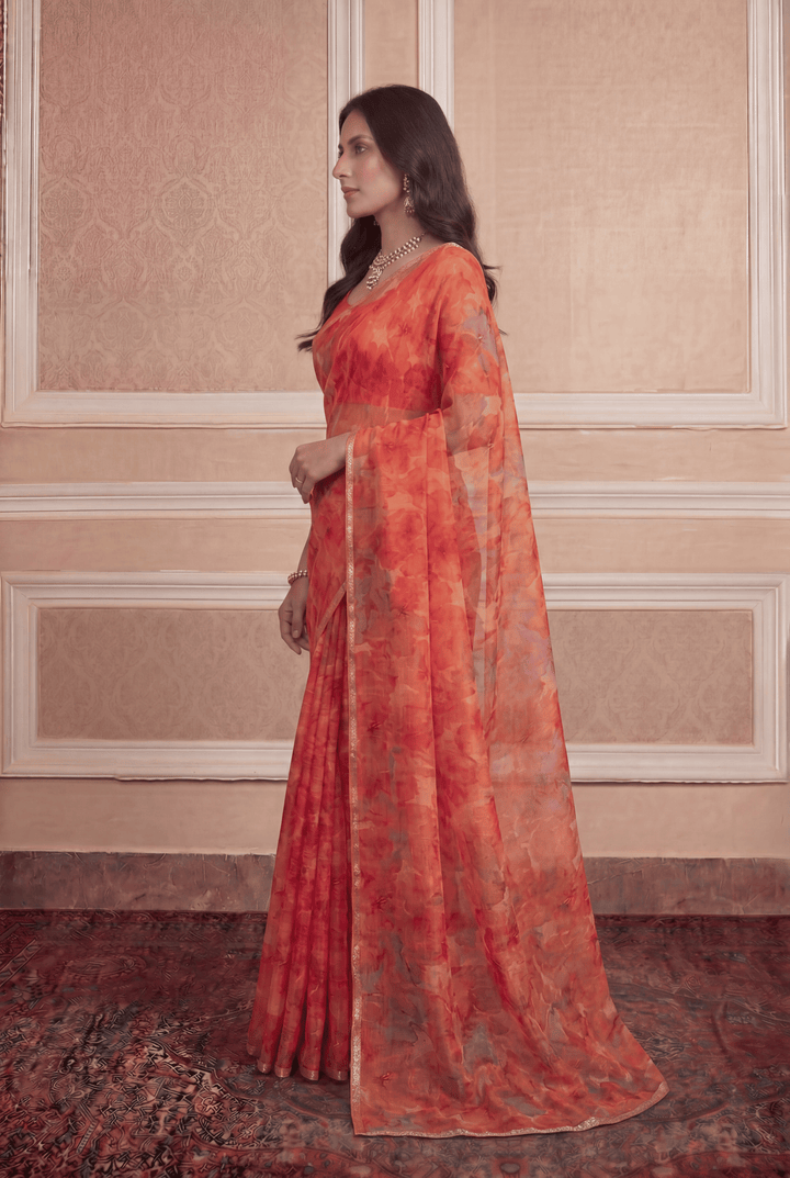 Printed Chiffon Saree with Zari work.