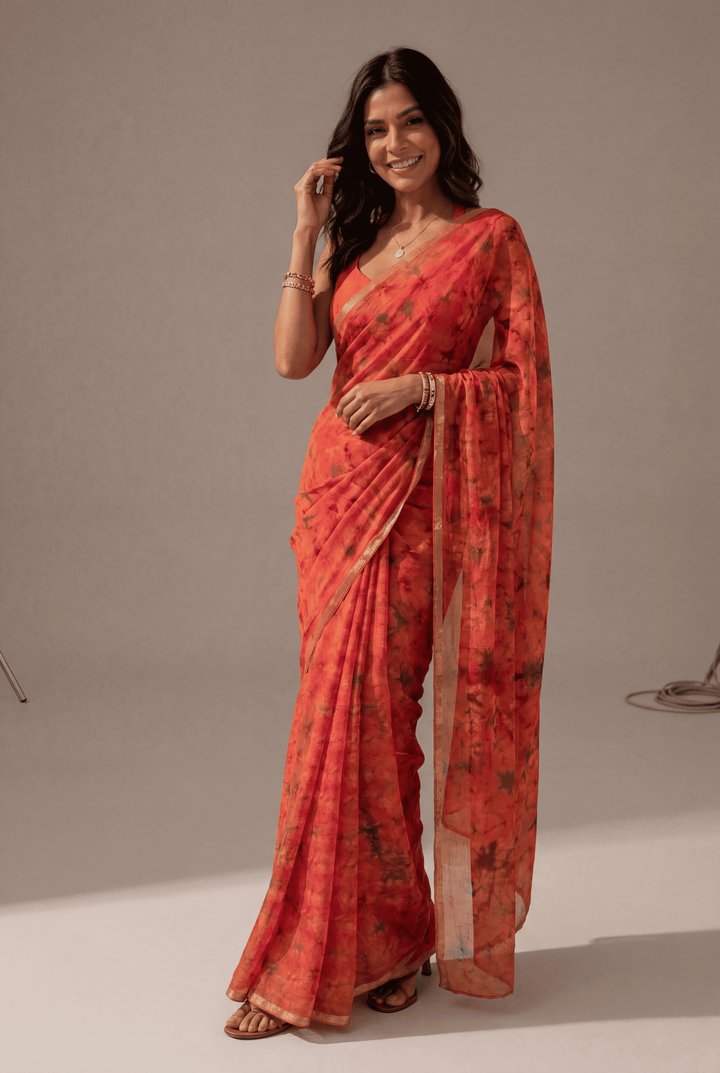 Printed Chiffon Saree with Zari work.
