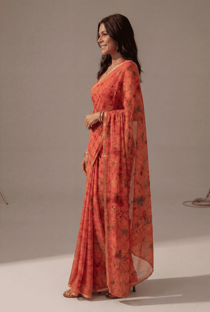 Printed Chiffon Saree with Zari work.
