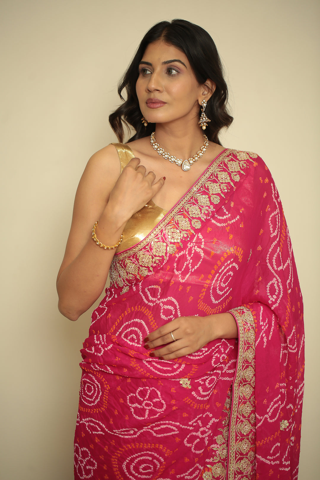 chinon bandhani Saree with Dori, Gota, Gota Patti, Zardozi work.