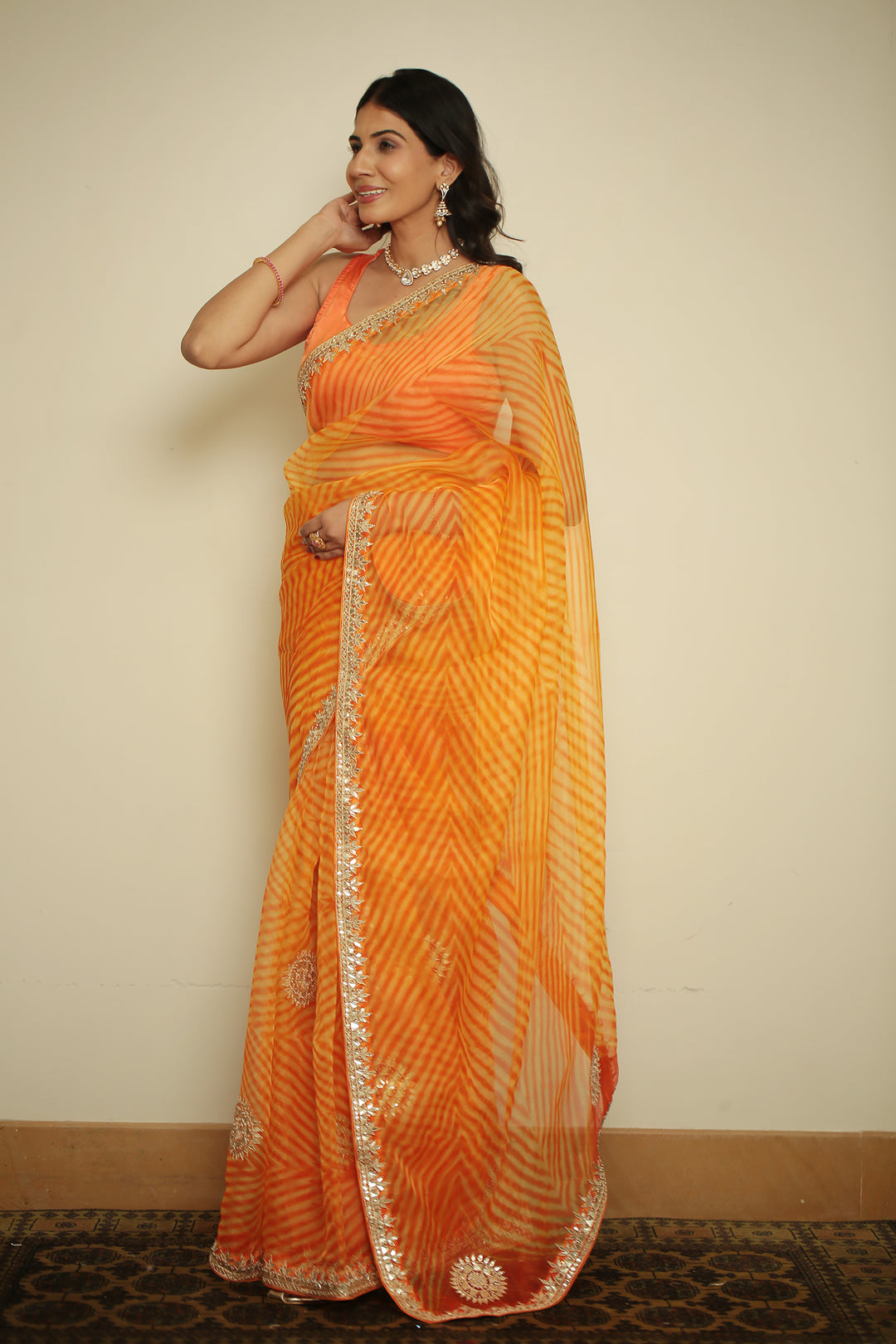 organza laheriya Saree with Dori, Gota, Gota Patti, Pearl, Zardozi work.