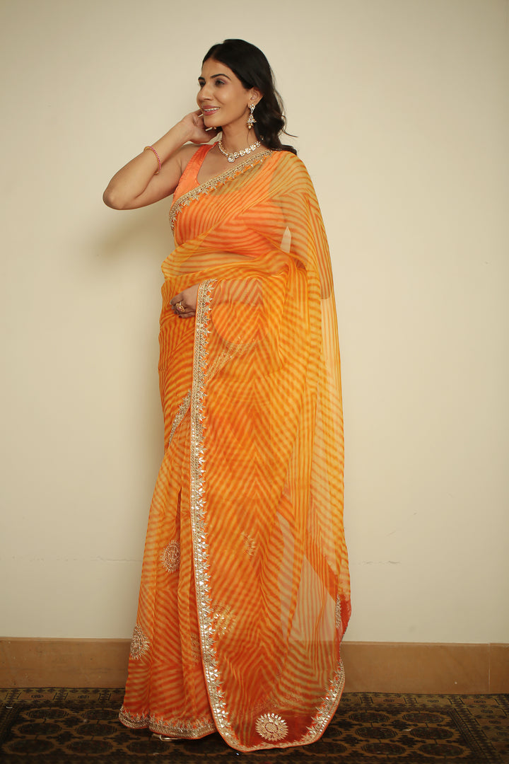 organza laheriya Saree with Dori, Gota, Gota Patti, Pearl, Zardozi work.