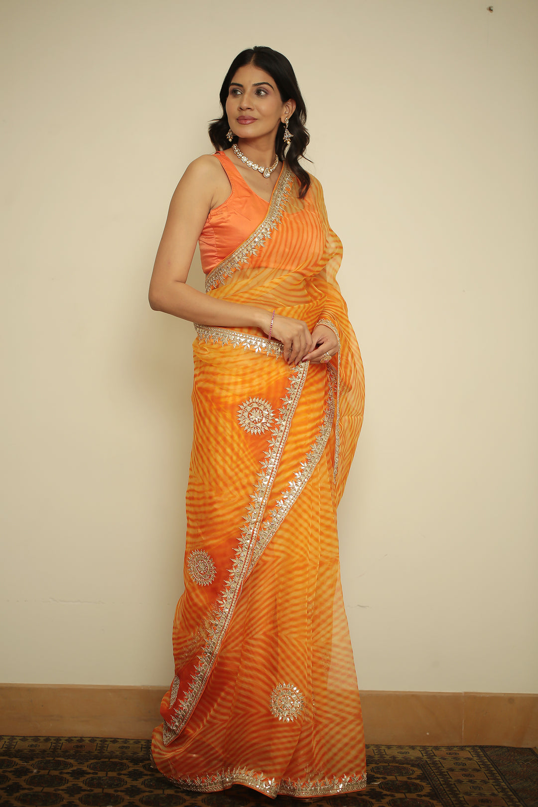 organza laheriya Saree with Dori, Gota, Gota Patti, Pearl, Zardozi work.