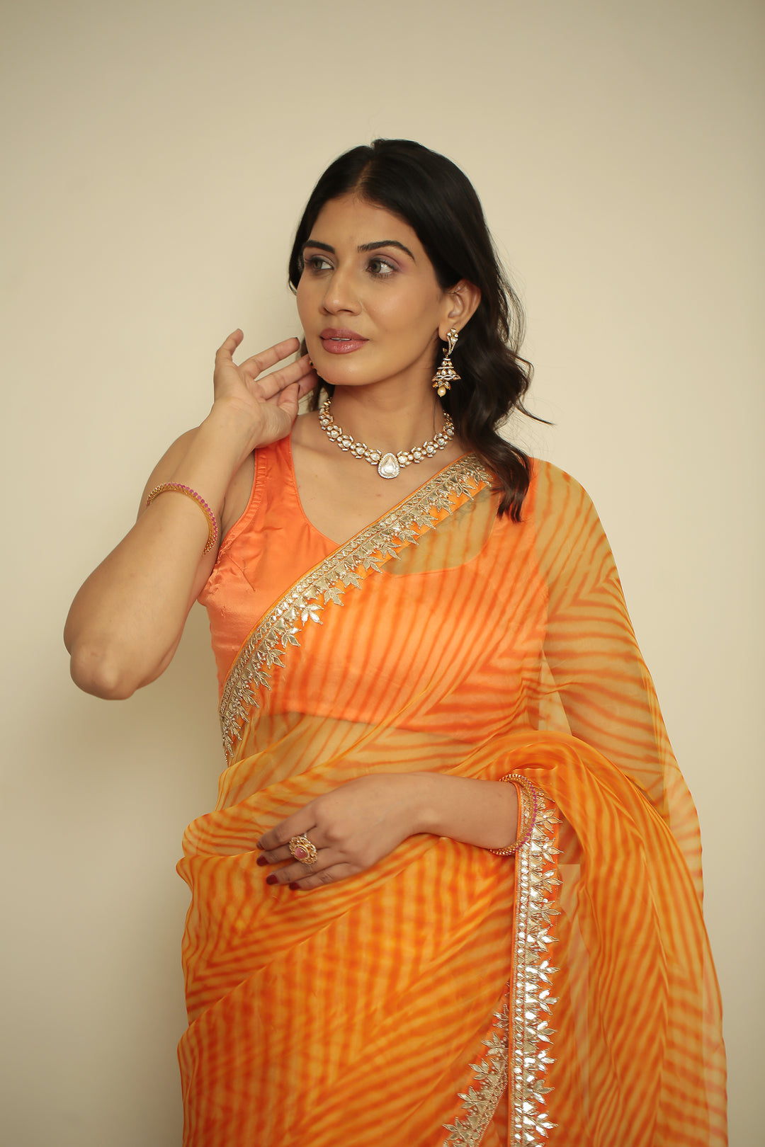 organza laheriya Saree with Dori, Gota, Gota Patti, Pearl, Zardozi work.