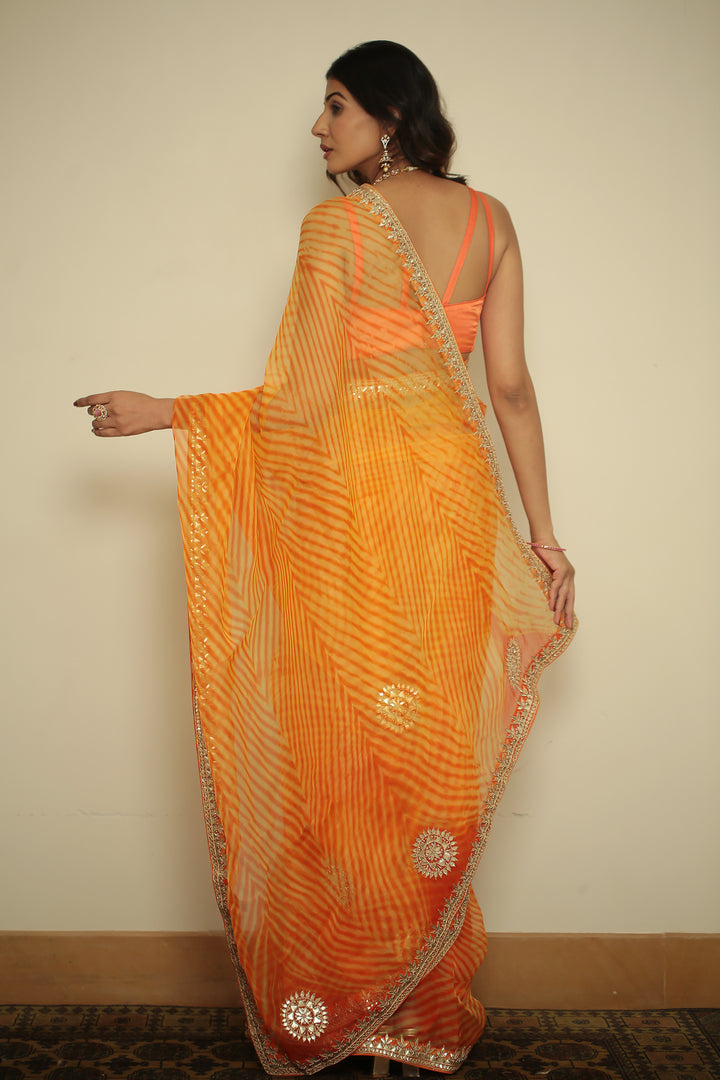 organza laheriya Saree with Dori, Gota, Gota Patti, Pearl, Zardozi work.