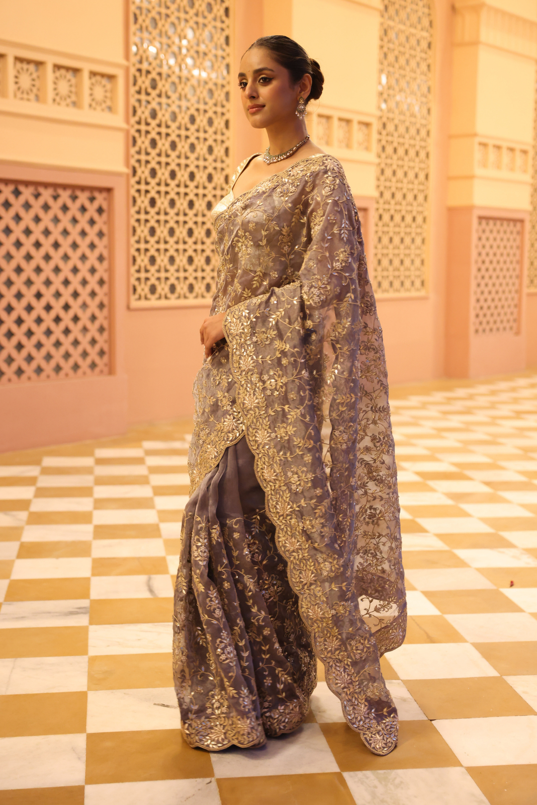 Tissue Saree with Dori, Pearl, Sequins, Zardozi work.