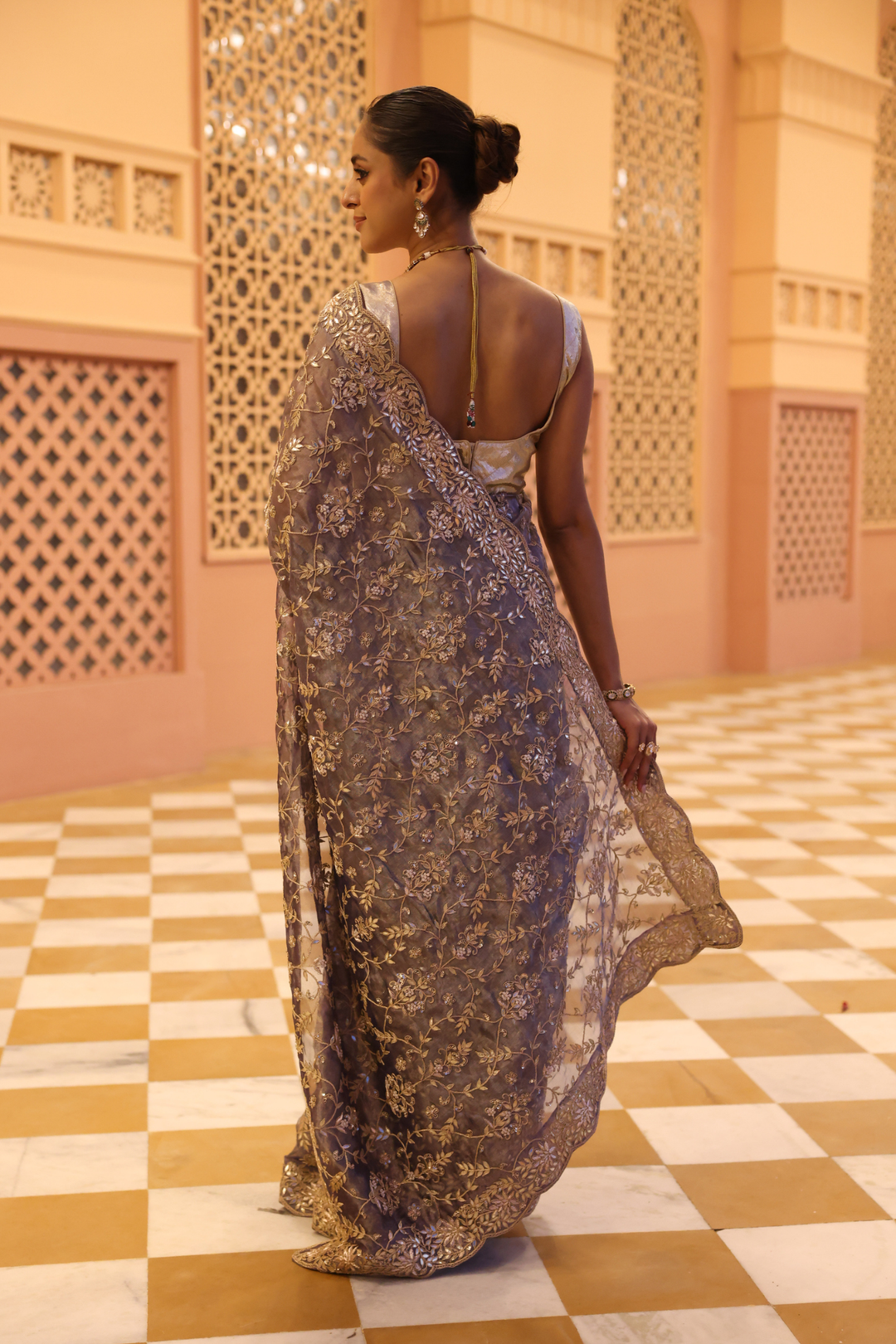 Tissue Saree with Dori, Pearl, Sequins, Zardozi work.