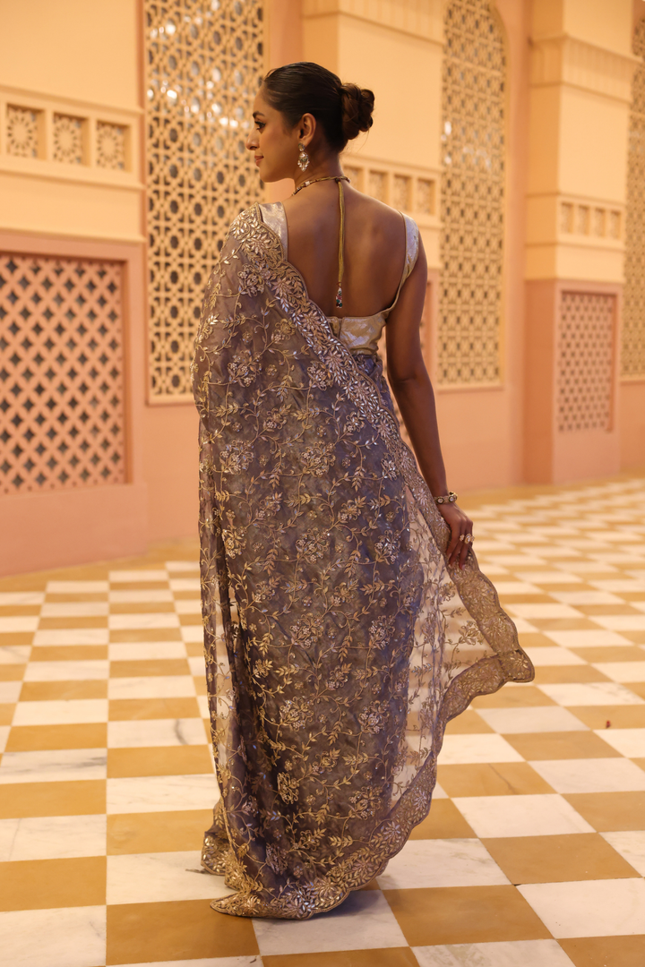 Tissue Saree with Dori, Pearl, Sequins, Zardozi work.