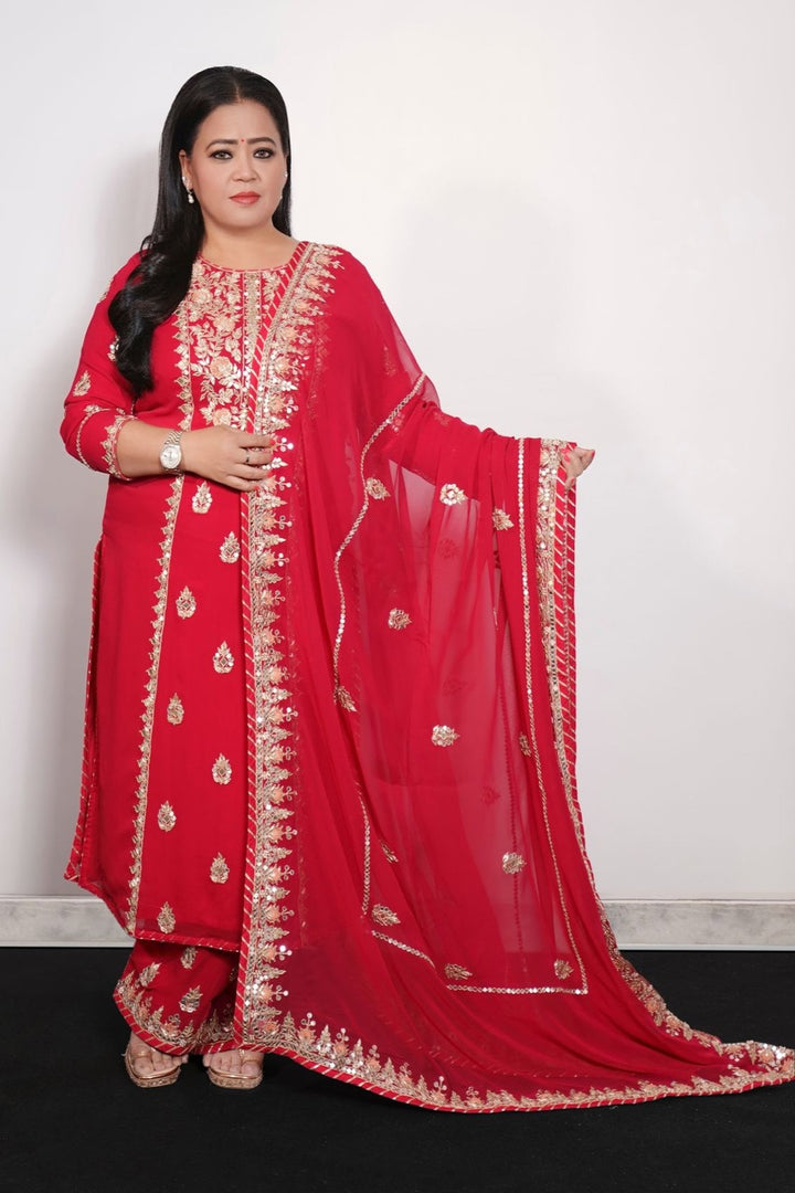 Exquisite Georgette Suit adorned with Gota Patti ,Thread, and Zardozi Embellishments.