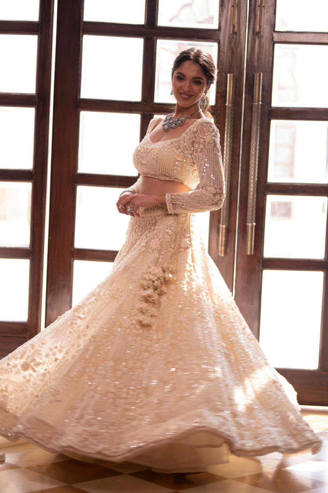 Elegant Net Lehenga Embroidered with Pearl, Sequins and Stone