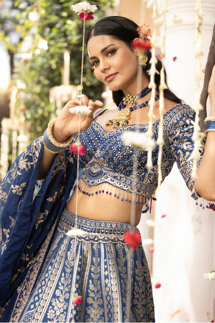 Handloom Banarasi silk Lehenga with Aari, Cutdana, Sequins, Stone, Thread, Zardozi, Zari work