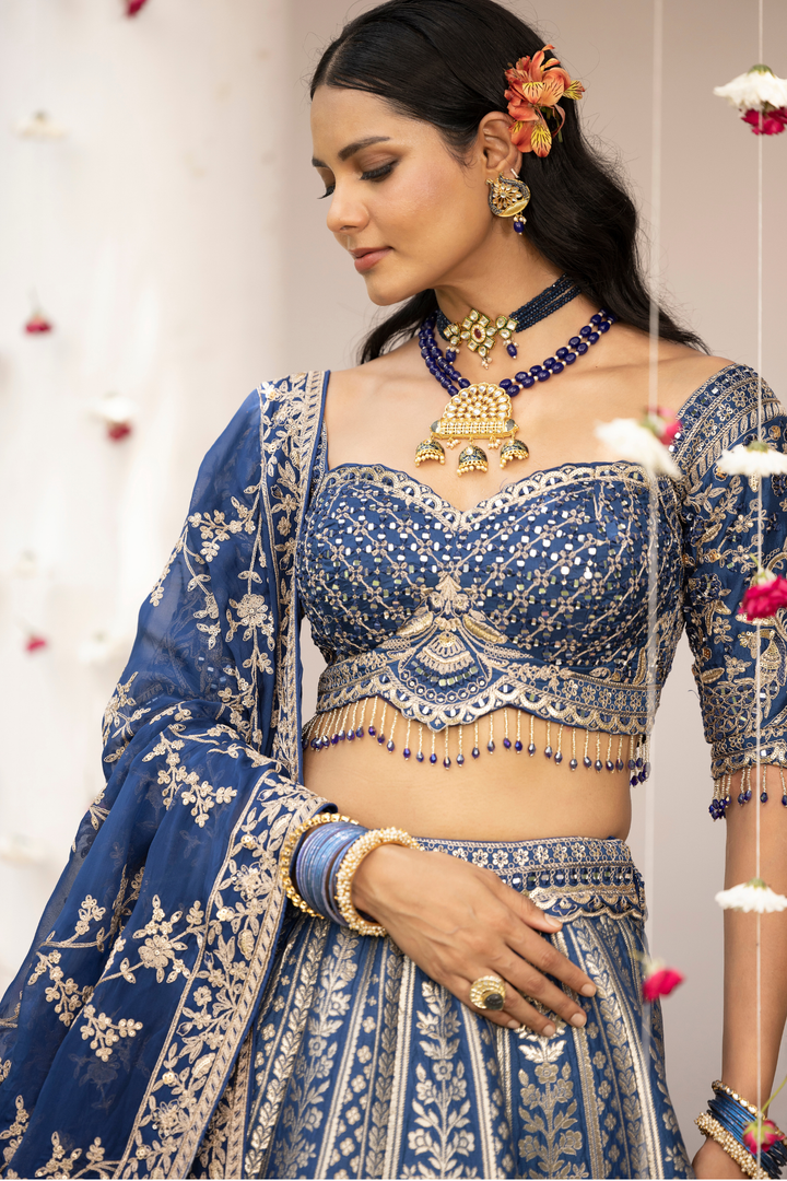Handloom Banarasi silk Lehenga with Aari, Cutdana, Sequins, Stone, Thread, Zardozi, Zari work