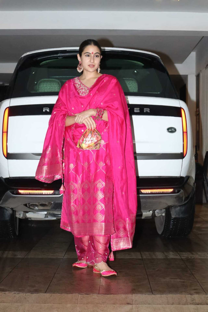 Handloom Dola Silk Suit Stitched with Gota Patti work.